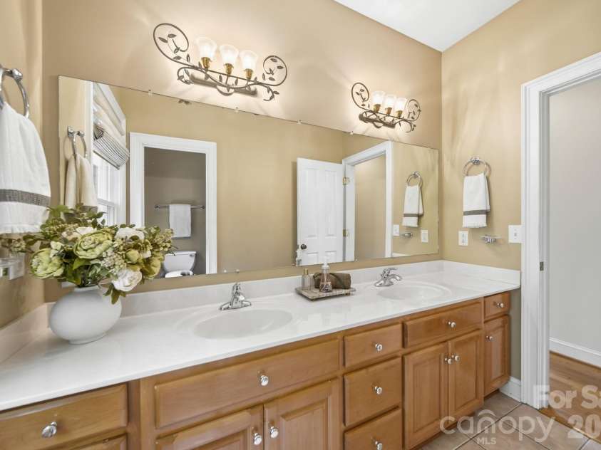 417 Crooked Oak Drive, Oakboro, NC 28129.  MLS# CAR4399226, YatesRealty ID 55048. Hall Bathroom