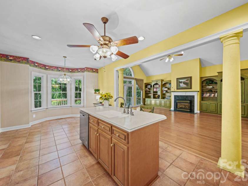 417 Crooked Oak Drive, Oakboro, NC 28129.  MLS# CAR4399226, YatesRealty ID 55048. Kitchen - Breakfast Area and Living Room