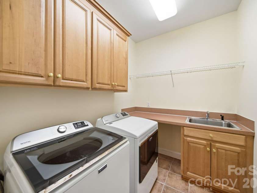 417 Crooked Oak Drive, Oakboro, NC 28129.  MLS# CAR4399226, YatesRealty ID 55048. Laundry/Utility Room