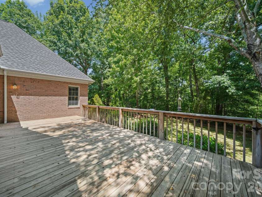 417 Crooked Oak Drive, Oakboro, NC 28129.  MLS# CAR4399226, YatesRealty ID 55048. Rear Deck