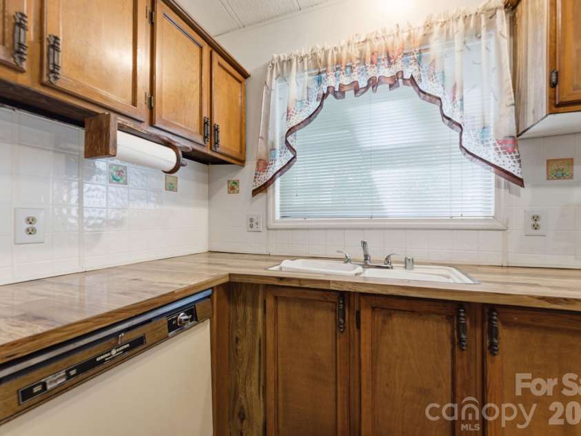 1200 Barkers Creek Road, Whittier, NC 28789.  MLS# CAR4432038, YatesRealty ID 55049. 