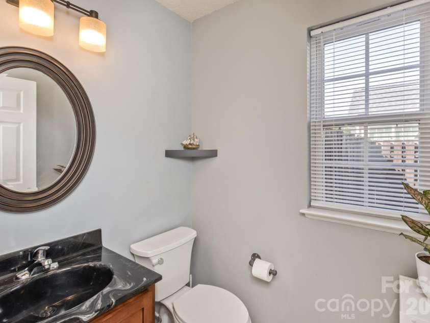 5 Lilac Fields Way, Arden, NC 28704.  MLS# CAR4425374, YatesRealty ID 55081. Downstairs half bath