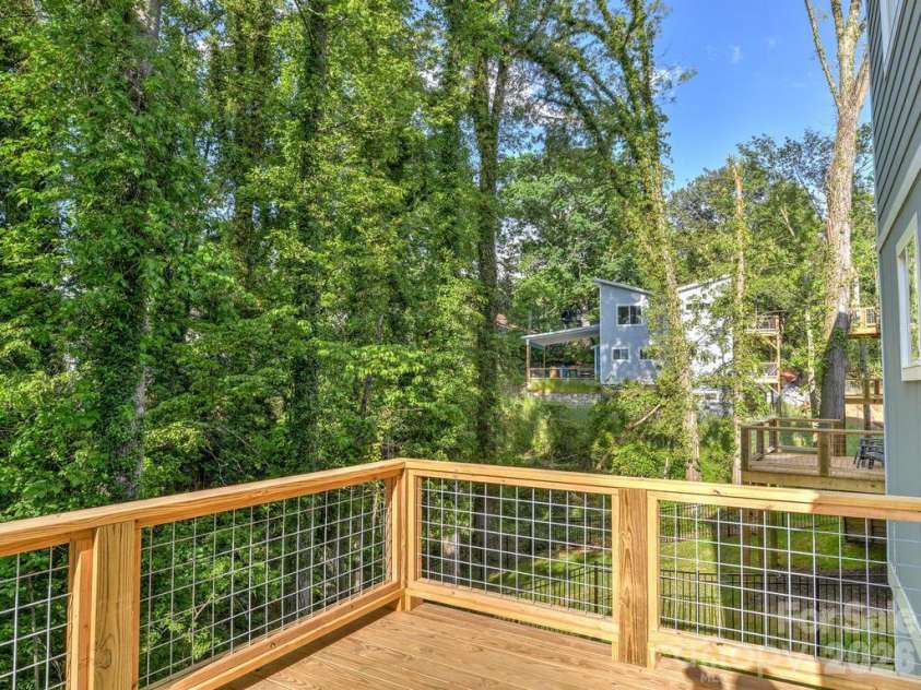 21 Wilmington Street, Asheville, NC 28806.  MLS# CAR4432133, YatesRealty ID 55086. Back deck off main level