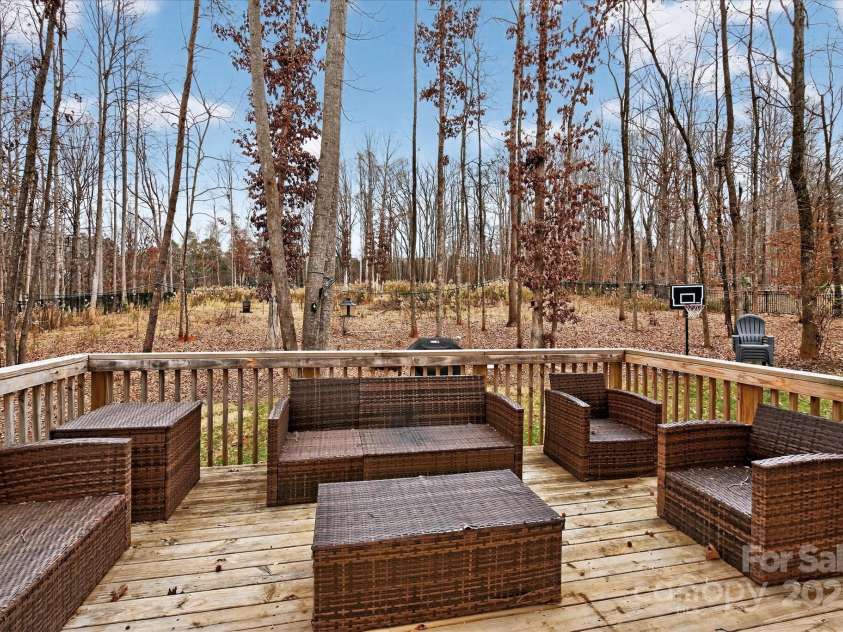 13017 Cinnamon Fern Lane, Mint Hill, NC 28227.  MLS# CAR4330864, YatesRealty ID 5509. Backyard patio-deck