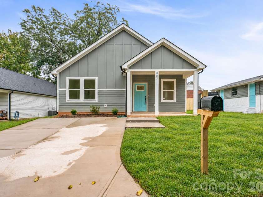 807 Cedar Street, East Spencer, NC 28039.  MLS# CAR4431367, YatesRealty ID 55096. Virtually staged grass
