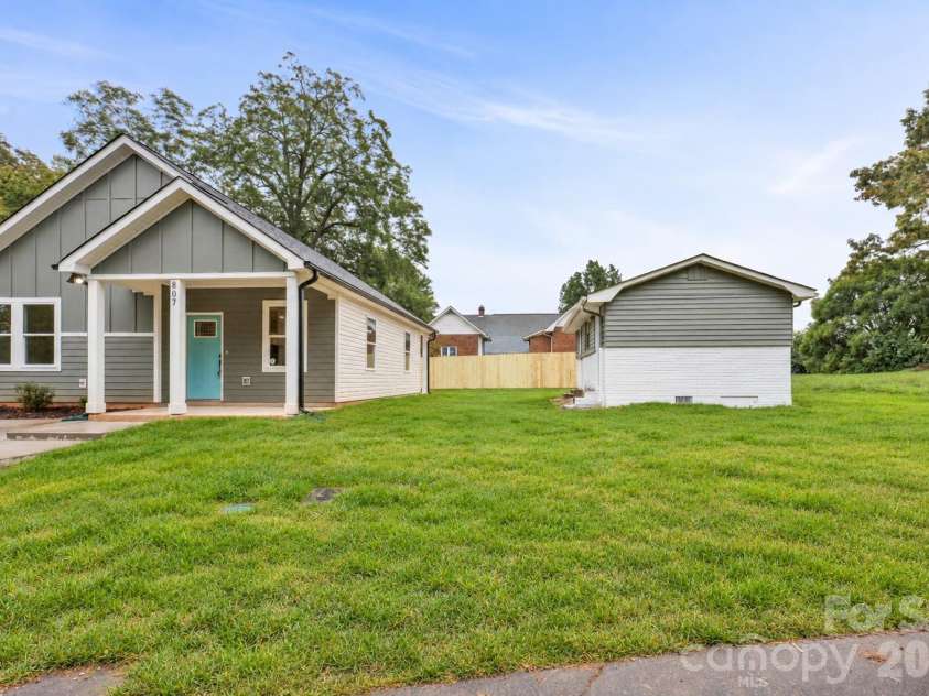 807 Cedar Street, East Spencer, NC 28039.  MLS# CAR4431367, YatesRealty ID 55096. Virtually staged grass