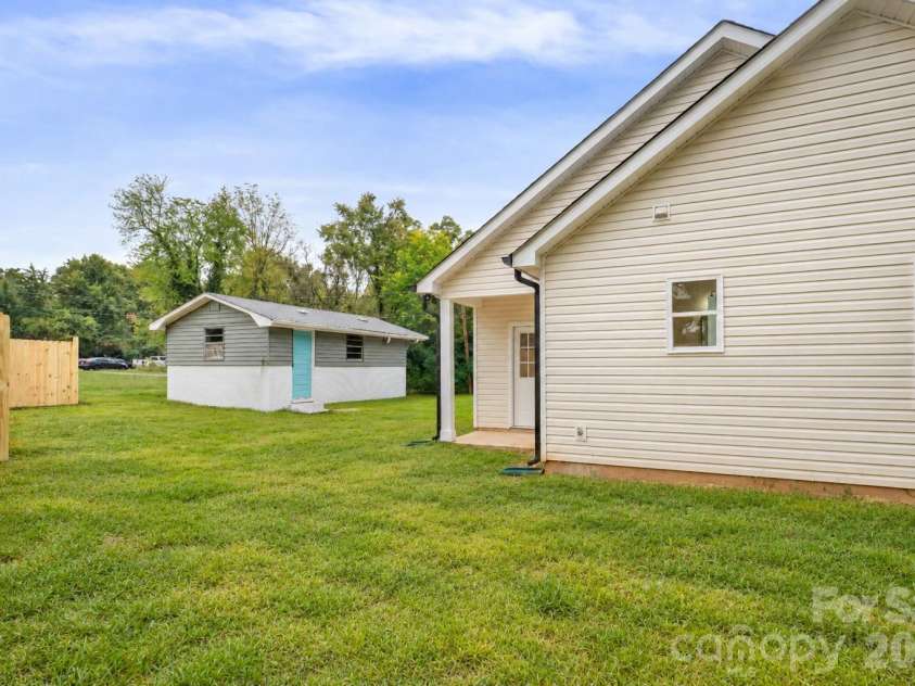 807 Cedar Street, East Spencer, NC 28039.  MLS# CAR4431367, YatesRealty ID 55096. Virtually staged grass