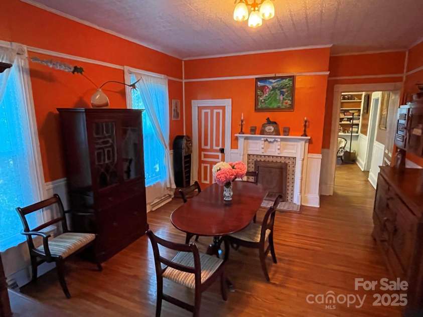 801 3rd Street, Spencer, NC 28159.  MLS# CAR4238622, YatesRealty ID 5510. Dining room with beautiful fireplace