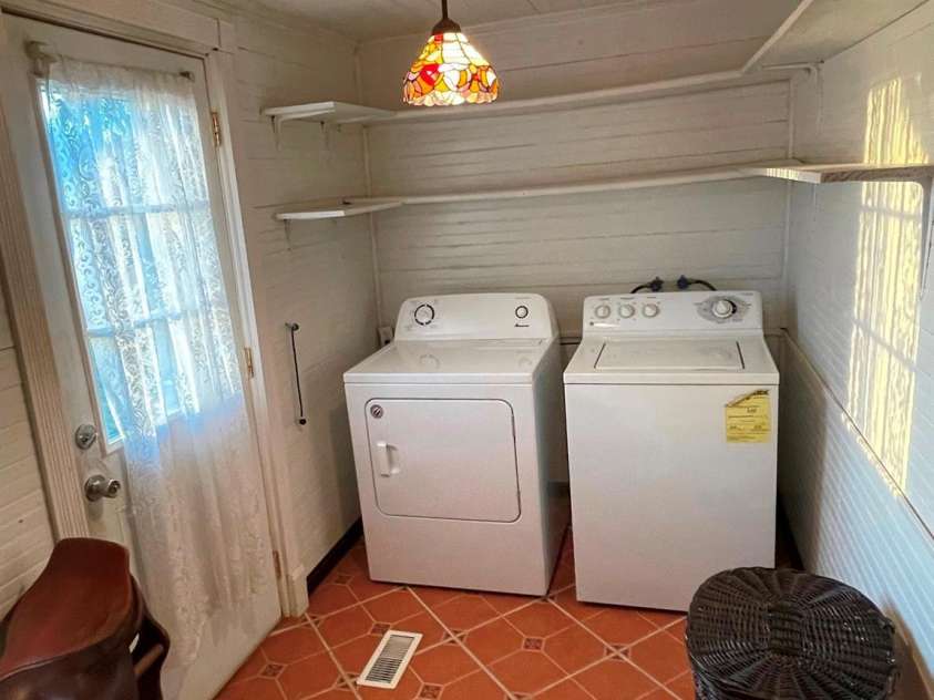 801 3rd Street, Spencer, NC 28159.  MLS# CAR4238622, YatesRealty ID 5510. Laundry room with door to back yard