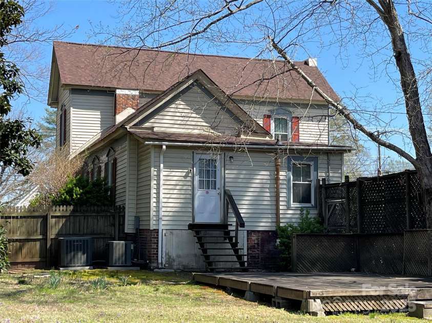 801 3rd Street, Spencer, NC 28159.  MLS# CAR4238622, YatesRealty ID 5510. Rear of home leading to deck