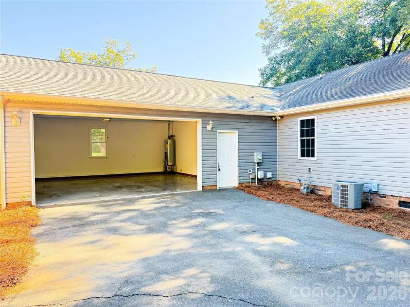 52 Roberta Road, Concord, NC 28027.  MLS# CAR4432169, YatesRealty ID 55103. Garage