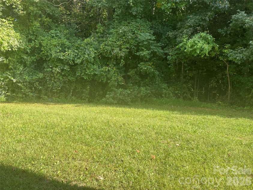 4002 Frank Vance Road, Charlotte, NC 28216.  MLS# CAR4432141, YatesRealty ID 55105. Back yard