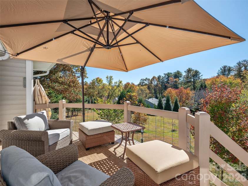 23 Old Applewood Lane, Hendersonville, NC 28739.  MLS# CAR4432097, YatesRealty ID 55107. Deck Overlooking the Grounds