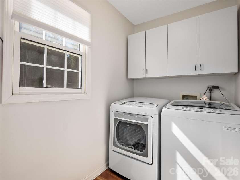 23 Old Applewood Lane, Hendersonville, NC 28739.  MLS# CAR4432097, YatesRealty ID 55107. Main-Level Laundry Room