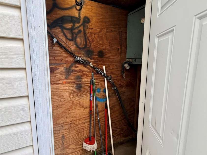 11011 Hunter Trail Lane, Charlotte, NC 28226.  MLS# CAR4429375, YatesRealty ID 55126. Storage closet back deck