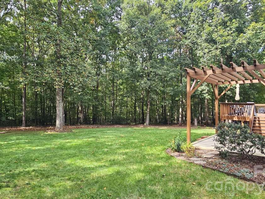 4587 Sawgrass Court, Denver, NC 28037.  MLS# CAR4431837, YatesRealty ID 55130. Back yard views