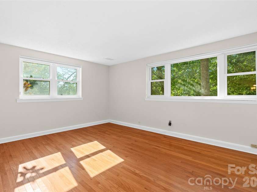 18 Northwood Road, Asheville, NC 28804.  MLS# CAR4429580, YatesRealty ID 55146. Lower level Bedroom #1.