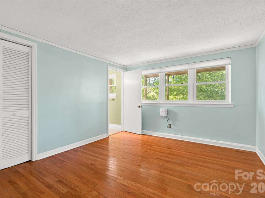 18 Northwood Road, Asheville, NC 28804.  MLS# CAR4429580, YatesRealty ID 55146. Lower level Bedroom #2.