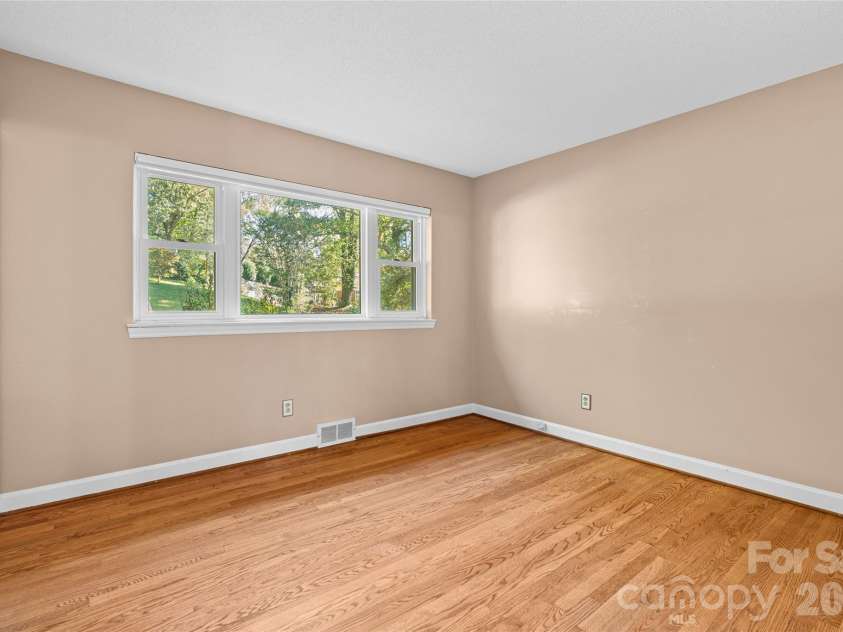 18 Northwood Road, Asheville, NC 28804.  MLS# CAR4429580, YatesRealty ID 55146. Main level bedroom #2.