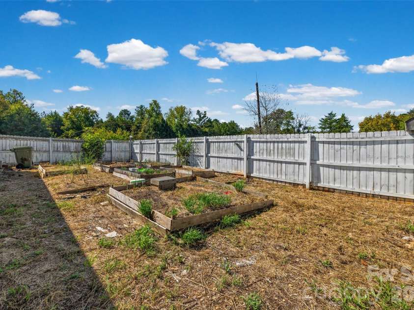 2129 Squire Road, Rock Hill, SC 29730.  MLS# CAR4423271, YatesRealty ID 55156. Fenced Garden Area