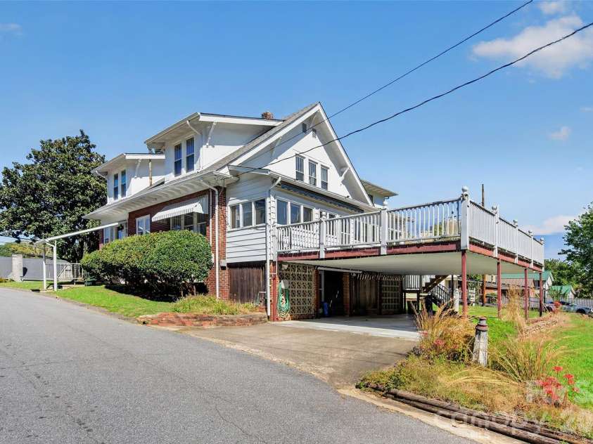 606 Rutherford Road, Marion, NC 28752.  MLS# CAR4429588, YatesRealty ID 55167. Large back deck with carport underneath