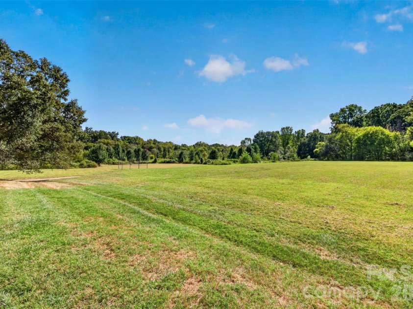 7609 Berrywood Circle, Huntersville, NC 28078.  MLS# CAR4430975, YatesRealty ID 55171. Community green space.