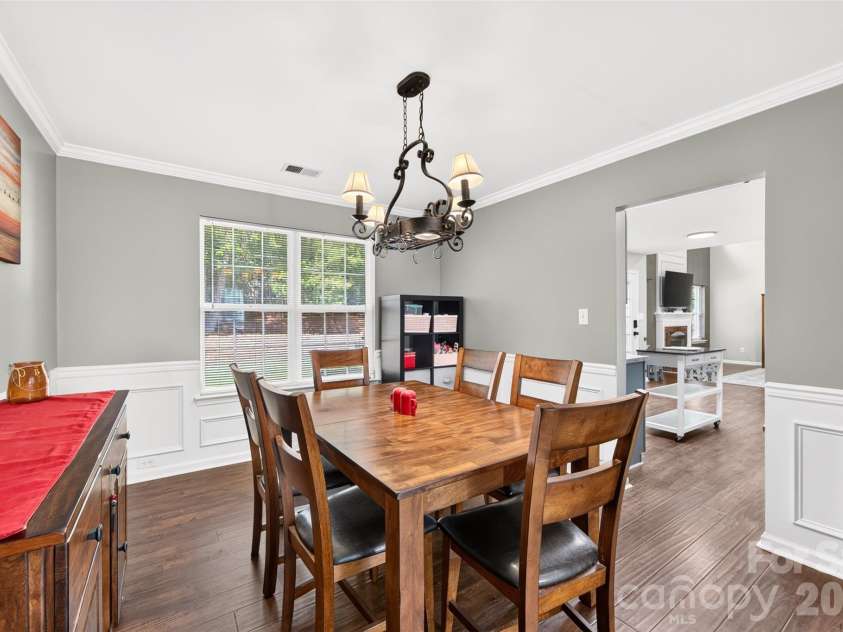 7609 Berrywood Circle, Huntersville, NC 28078.  MLS# CAR4430975, YatesRealty ID 55171. Dining room provides easy access into the kitchen and great room.
