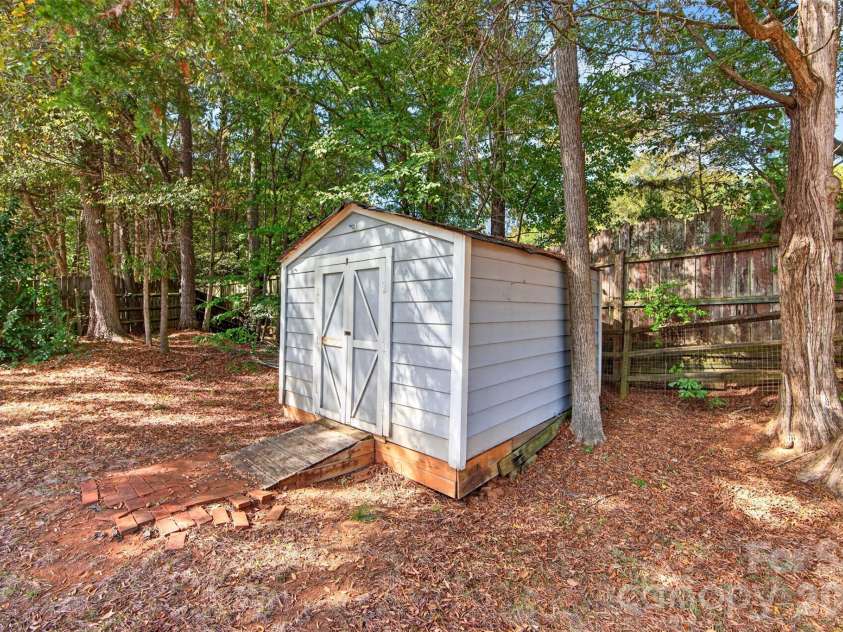 7609 Berrywood Circle, Huntersville, NC 28078.  MLS# CAR4430975, YatesRealty ID 55171. Exterior shed for additional storage.