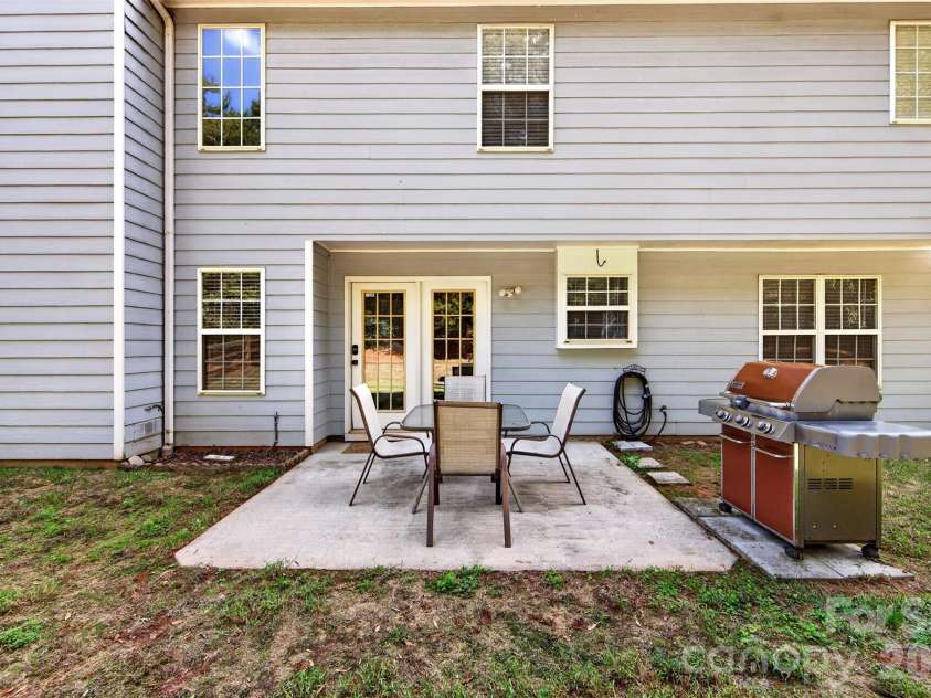 7609 Berrywood Circle, Huntersville, NC 28078.  MLS# CAR4430975, YatesRealty ID 55171. Large concrete patio for entertaining.