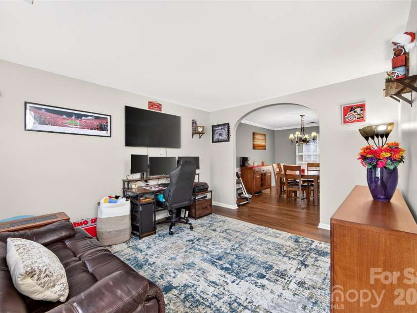 7609 Berrywood Circle, Huntersville, NC 28078.  MLS# CAR4430975, YatesRealty ID 55171. Sitting room/additional flex space on the main floor that can be used for multiple purposes (sitting room, office, play area, etc.).