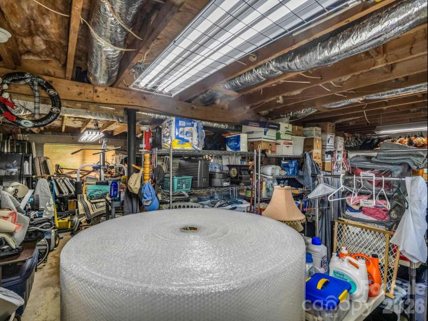 72 & 90 McEntire Road, Tryon, NC 28782.  MLS# CAR4385841, YatesRealty ID 55174. Basement