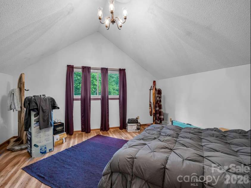 72 & 90 McEntire Road, Tryon, NC 28782.  MLS# CAR4385841, YatesRealty ID 55174. Garage apartment bedroom