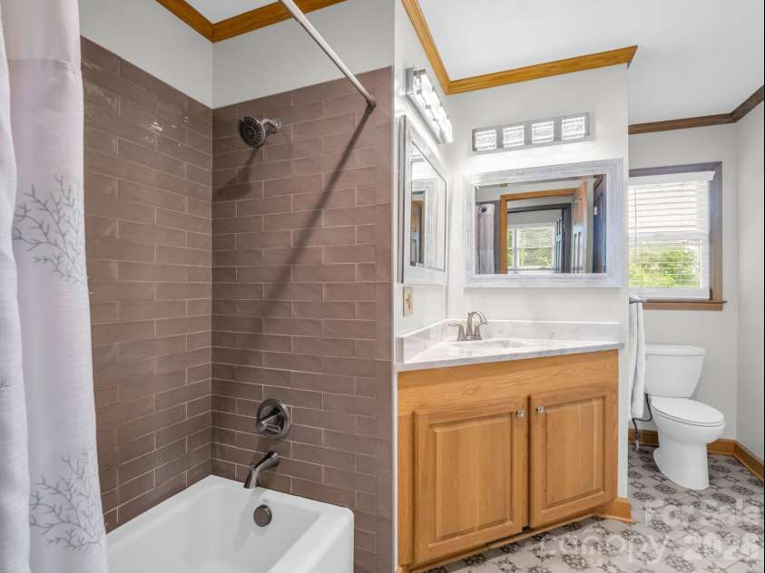 72 & 90 McEntire Road, Tryon, NC 28782.  MLS# CAR4385841, YatesRealty ID 55174. Guest bath