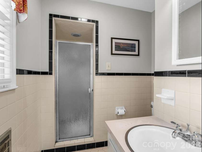 72 & 90 McEntire Road, Tryon, NC 28782.  MLS# CAR4385841, YatesRealty ID 55174. Primary bath