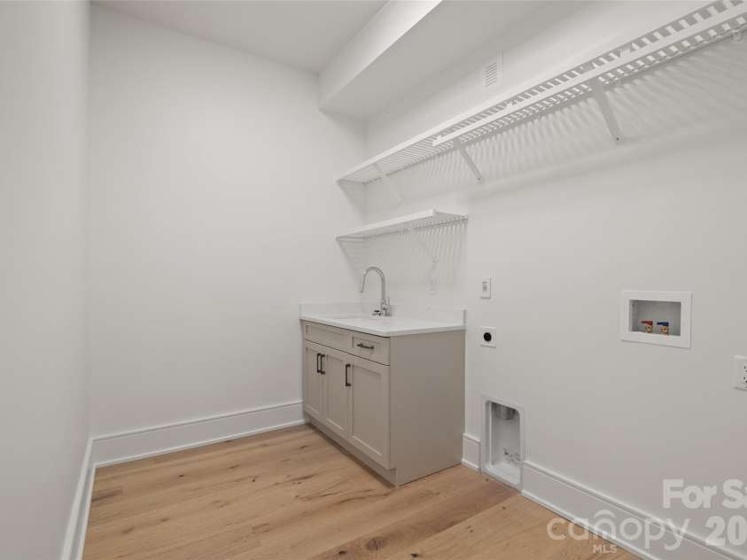 505 Barrington Drive, Asheville, NC 28803.  MLS# CAR4430029, YatesRealty ID 55175. Basement level laundry