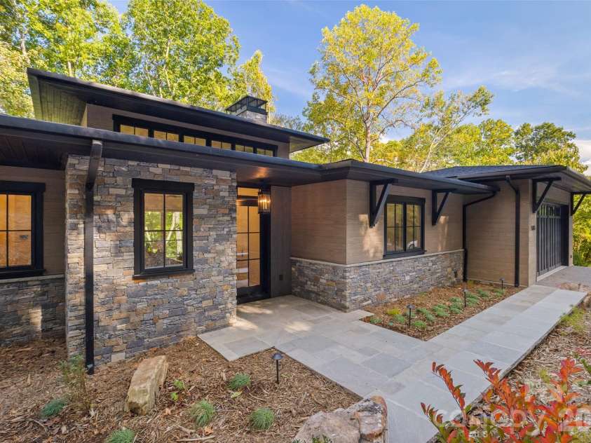 505 Barrington Drive, Asheville, NC 28803.  MLS# CAR4430029, YatesRealty ID 55175. Flagstone path to front entry