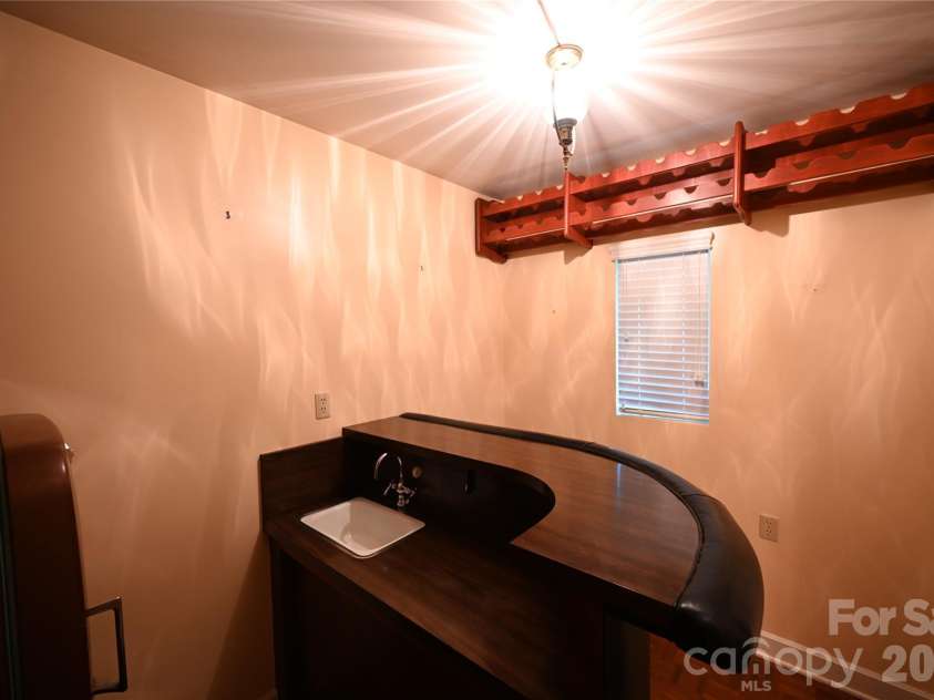1308 Laurel Street, Valdese, NC 28690.  MLS# CAR4432048, YatesRealty ID 55194. Lower level bar room