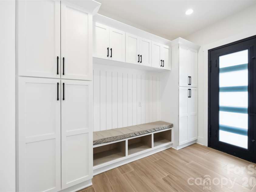 8223 Max Meadows Drive, Charlotte, NC 28227.  MLS# CAR4432295, YatesRealty ID 55214. Basement Mug room