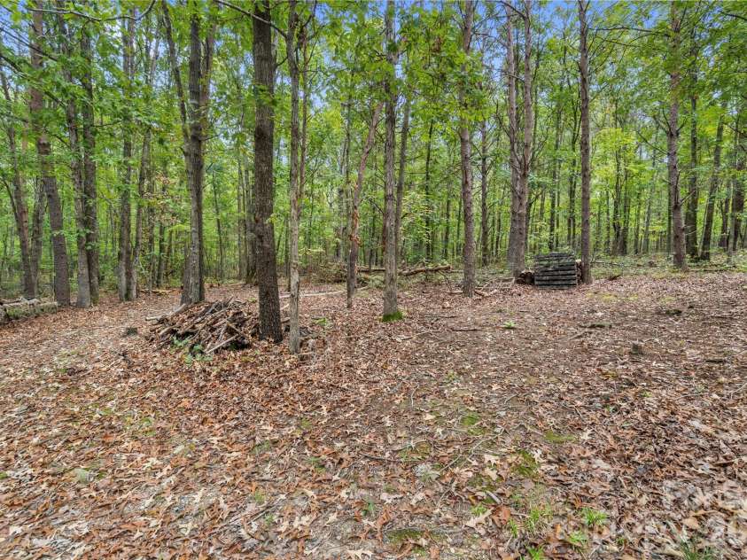 15810 Silver Road, Oakboro, NC 28129.  MLS# CAR4432319, YatesRealty ID 55223. Backyard