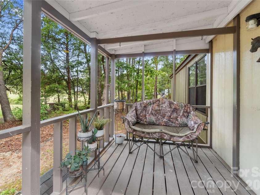 15810 Silver Road, Oakboro, NC 28129.  MLS# CAR4432319, YatesRealty ID 55223. Covered front porch