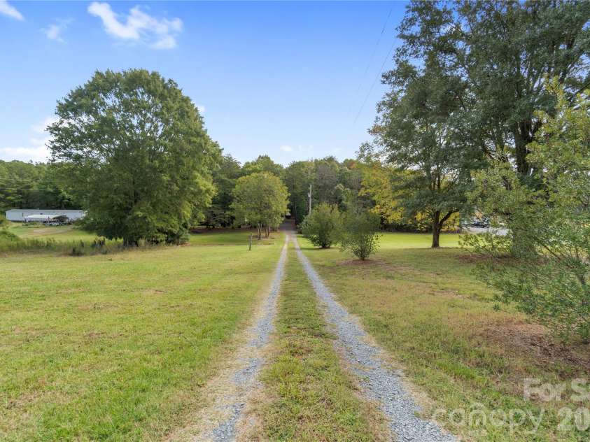 15810 Silver Road, Oakboro, NC 28129.  MLS# CAR4432319, YatesRealty ID 55223. Driveway