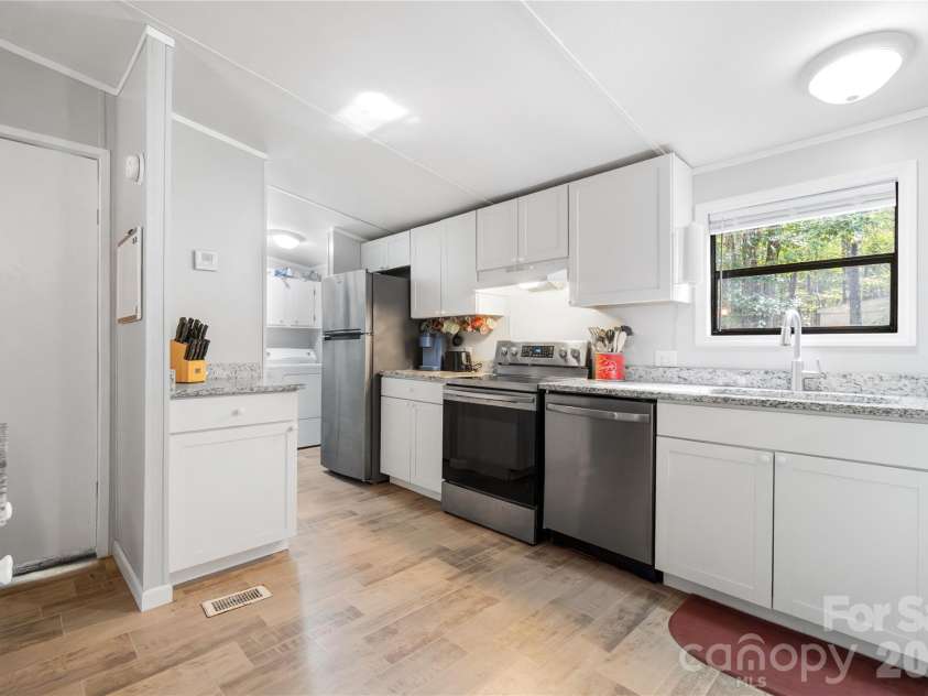 15810 Silver Road, Oakboro, NC 28129.  MLS# CAR4432319, YatesRealty ID 55223. Kitchen