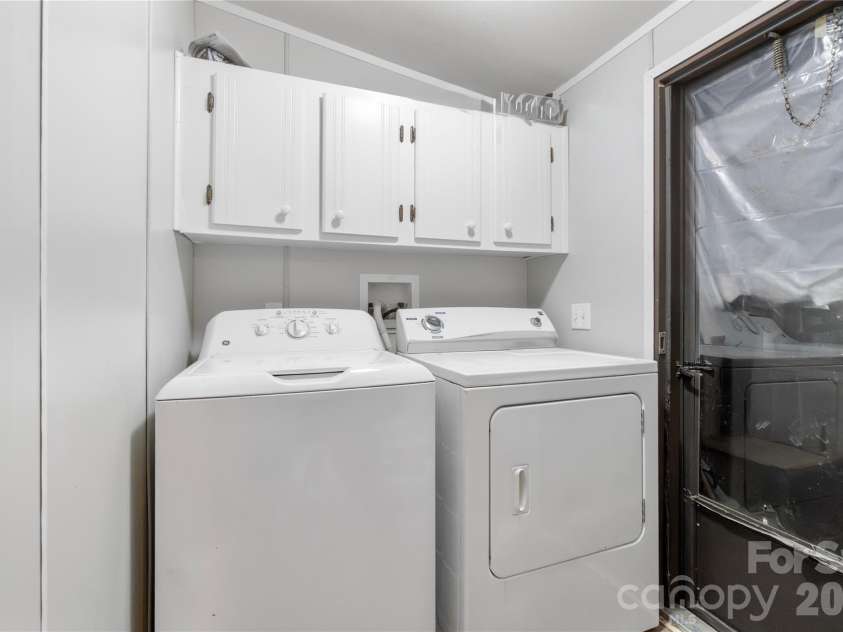 15810 Silver Road, Oakboro, NC 28129.  MLS# CAR4432319, YatesRealty ID 55223. Laundry