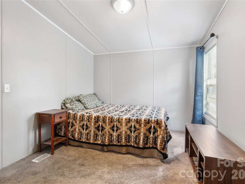 15810 Silver Road, Oakboro, NC 28129.  MLS# CAR4432319, YatesRealty ID 55223. Secondary Bedroom