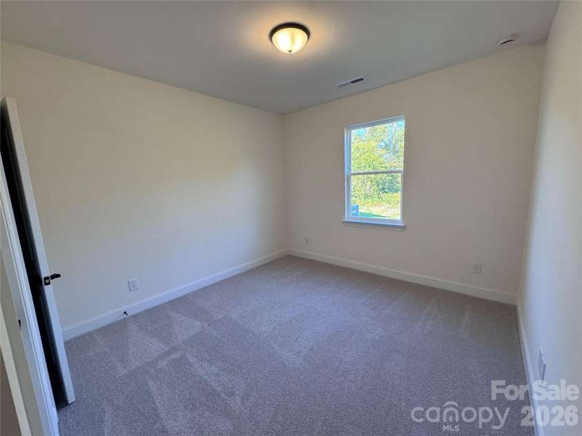 2760 Ashton Park Lane, Monroe, NC 28110.  MLS# CAR4432364, YatesRealty ID 55224. Guest Bedroom