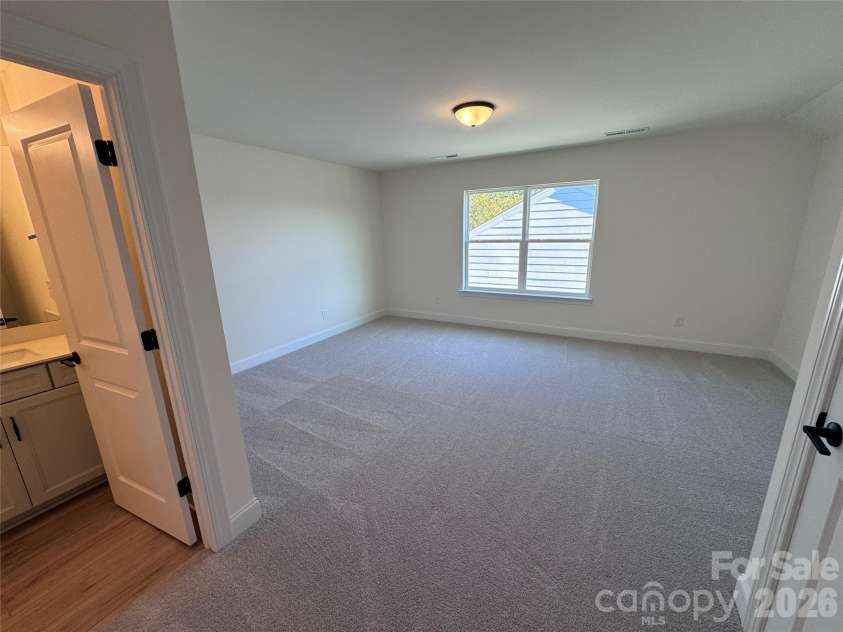2760 Ashton Park Lane, Monroe, NC 28110.  MLS# CAR4432364, YatesRealty ID 55224. Upper level bedroom
