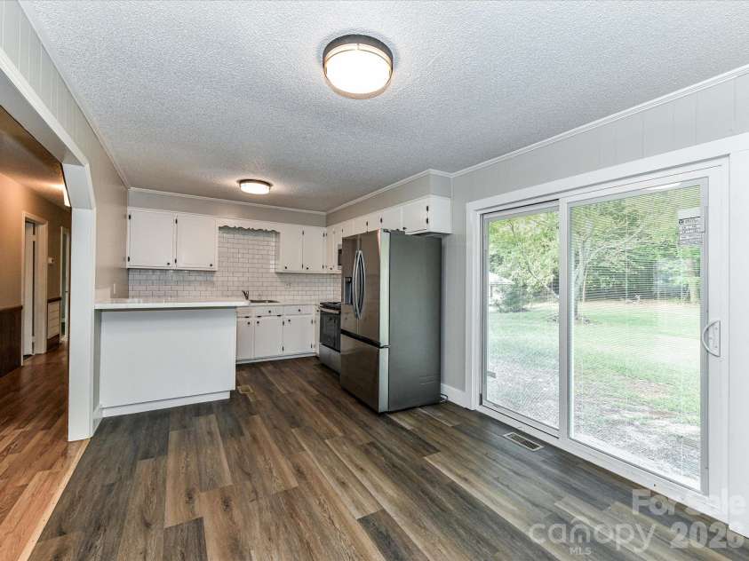 205 Oakland Street, Locust, NC 28097.  MLS# CAR4430849, YatesRealty ID 55225. 