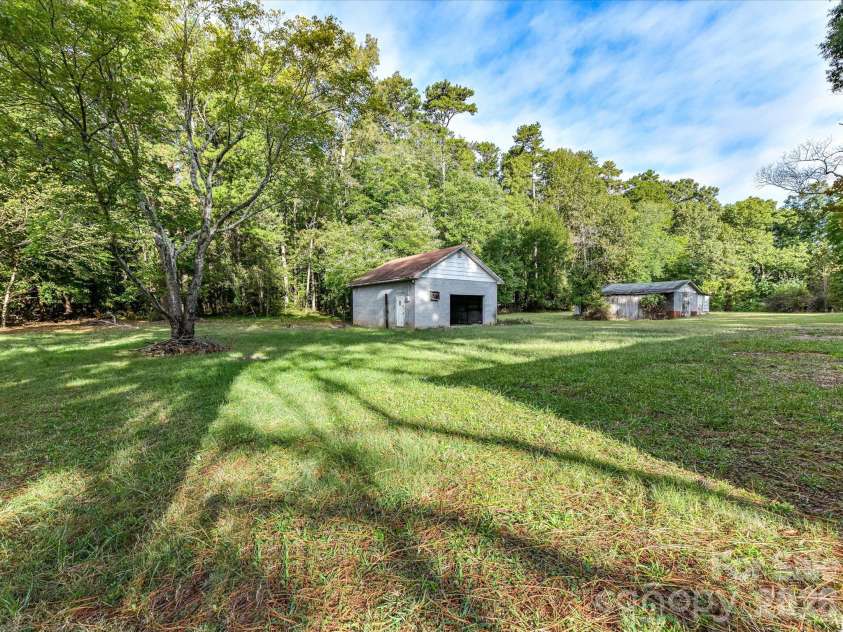 205 Oakland Street, Locust, NC 28097.  MLS# CAR4430849, YatesRealty ID 55225. 