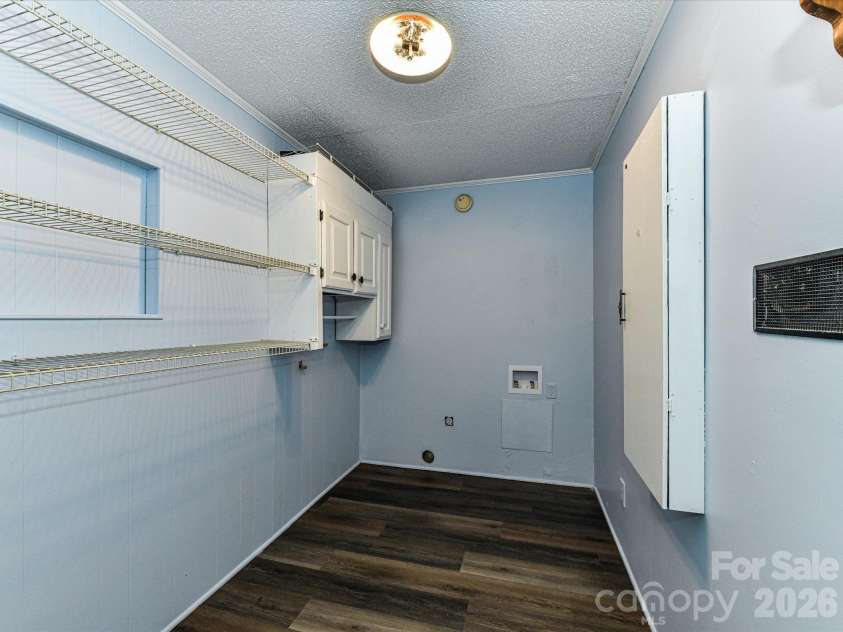 205 Oakland Street, Locust, NC 28097.  MLS# CAR4430849, YatesRealty ID 55225. Laundry Room