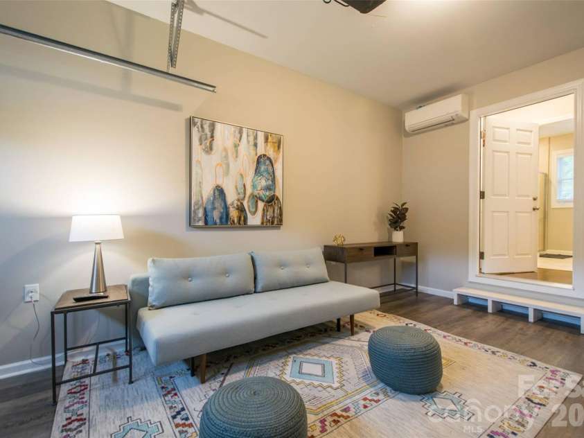 309 Jenna Clare Lane, Asheville, NC 28803.  MLS# CAR4428710, YatesRealty ID 55229. Converted garage for extra space